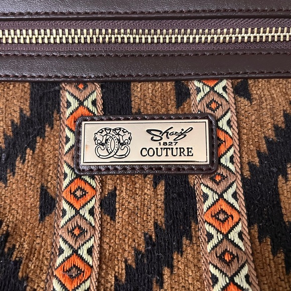 Sharif Couture
Beaded Tapestry
Tote with Leather Trim - Picture 6 of 16